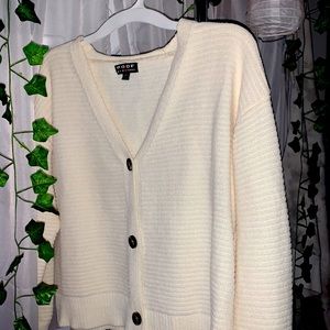 New York style- medium cream sweater.